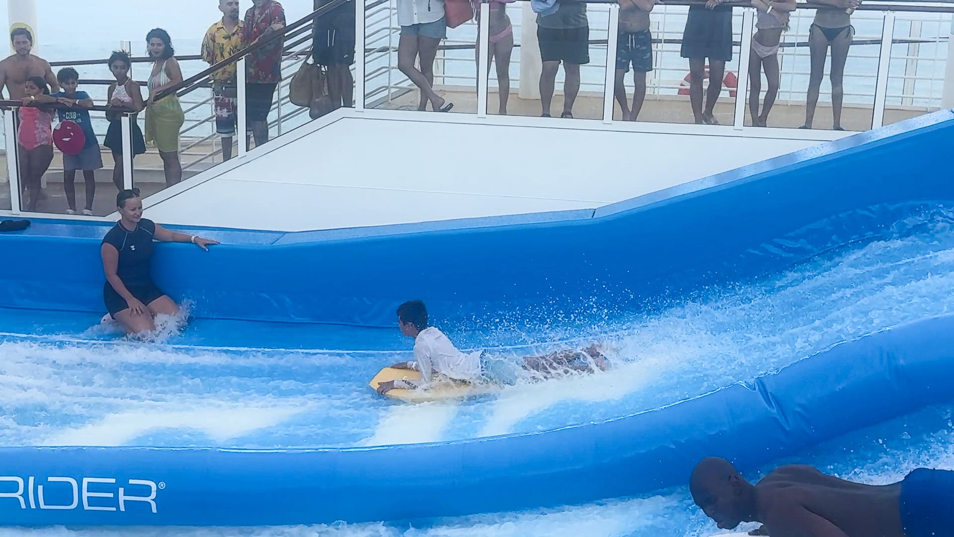 my son on Flowrider on Utopia of the Seas