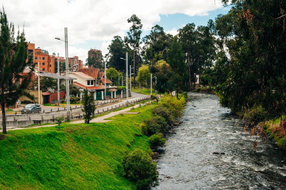 Tomebamba River and public park View of the river Tomebamba and public park along the river that crosses the center city of Cuenca