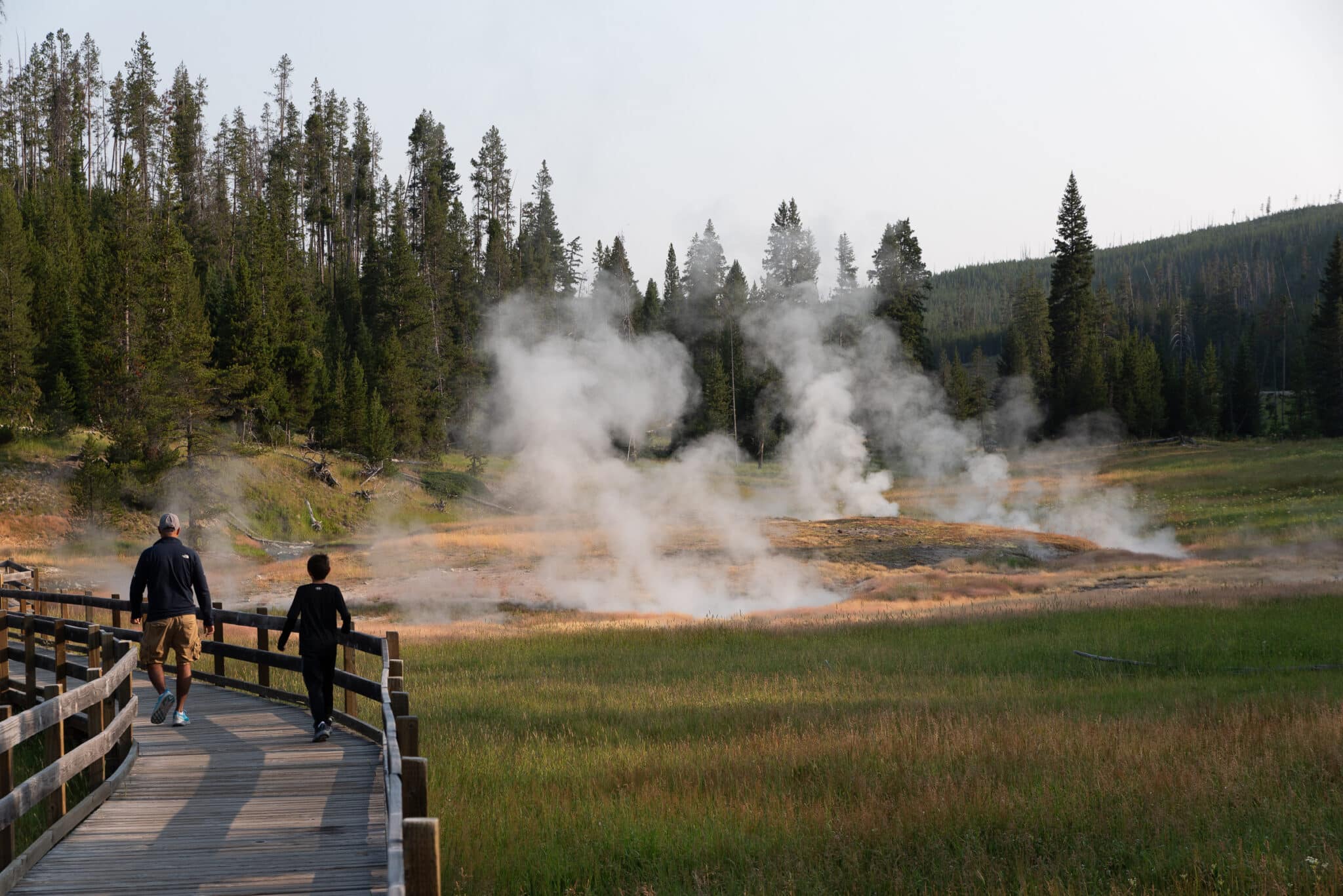 my family on the boardwalk to Clearwater Spring at Yellowstone National Park