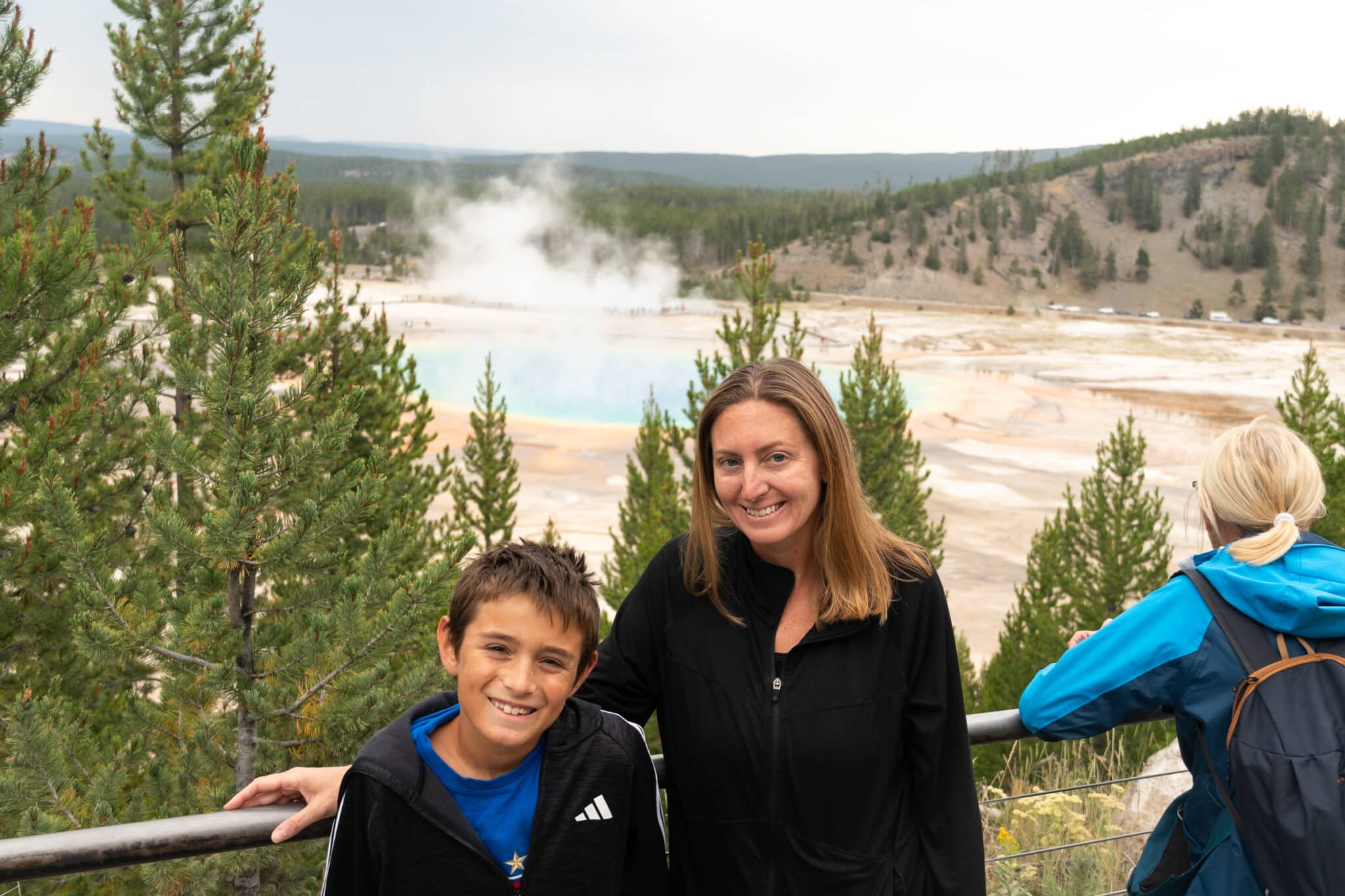 my son and I with Grand Prismatic in the background