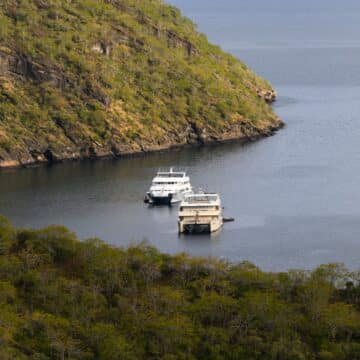 the ecogalaxy cruise ship in a cove in the galapagos