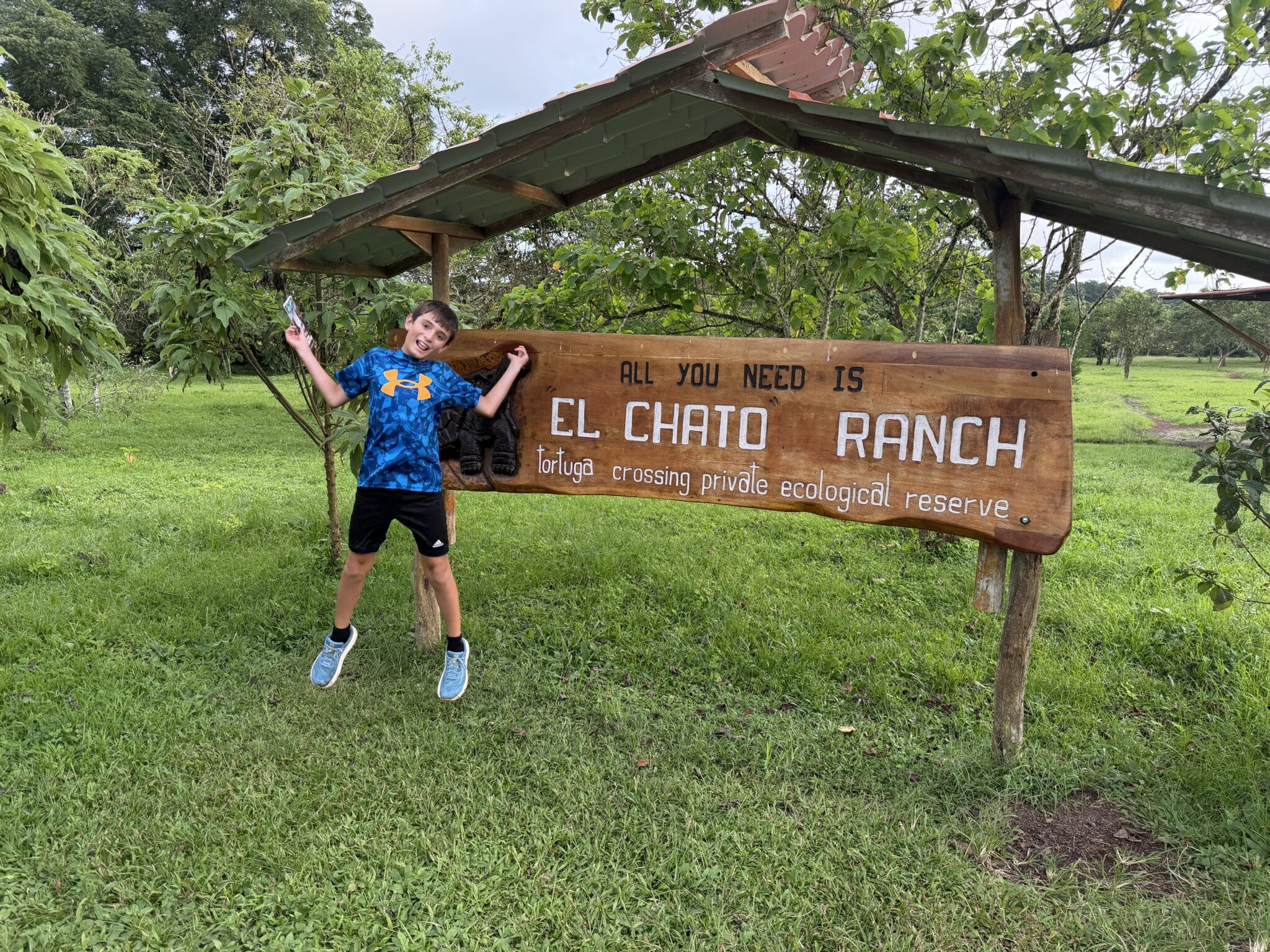 my son at the el chato tortoise ranch in galapagos