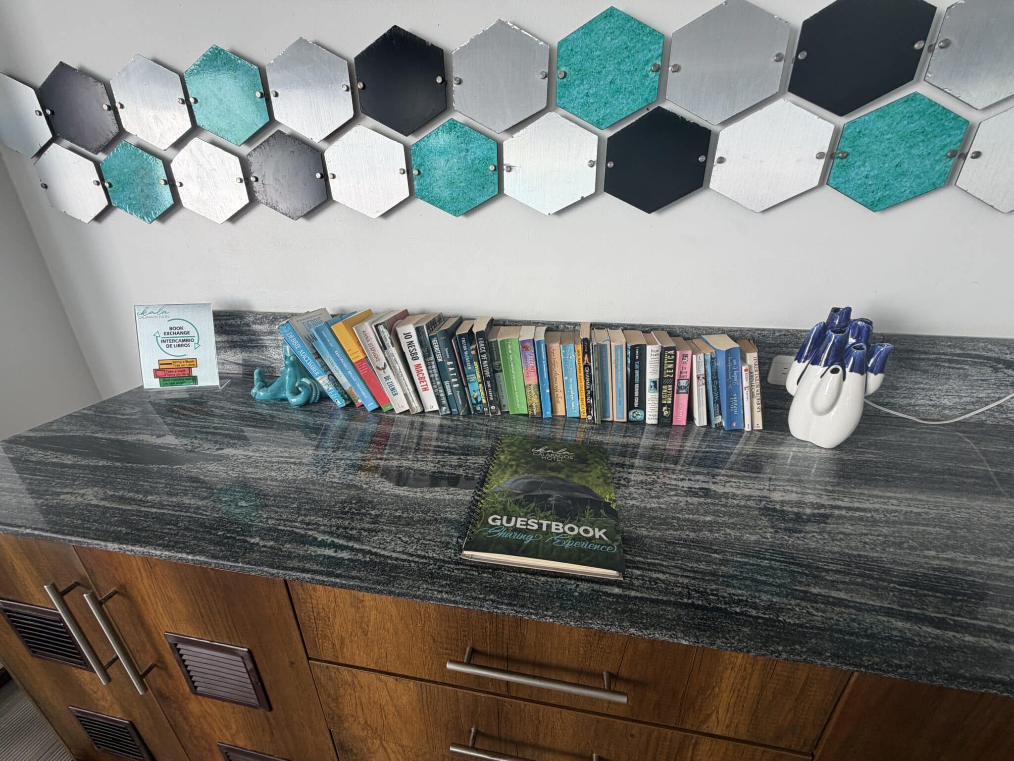 book exchange by the pool at hotel ikala galapagos
